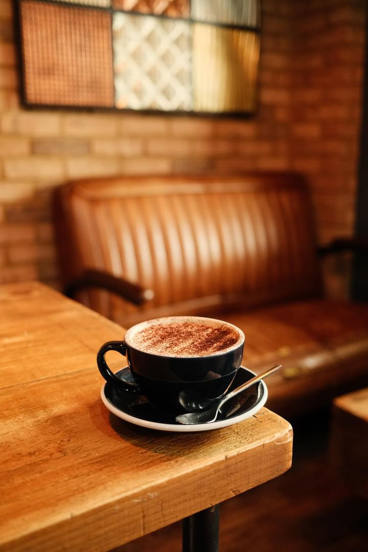 Coffee on the bench at Coffee Squared